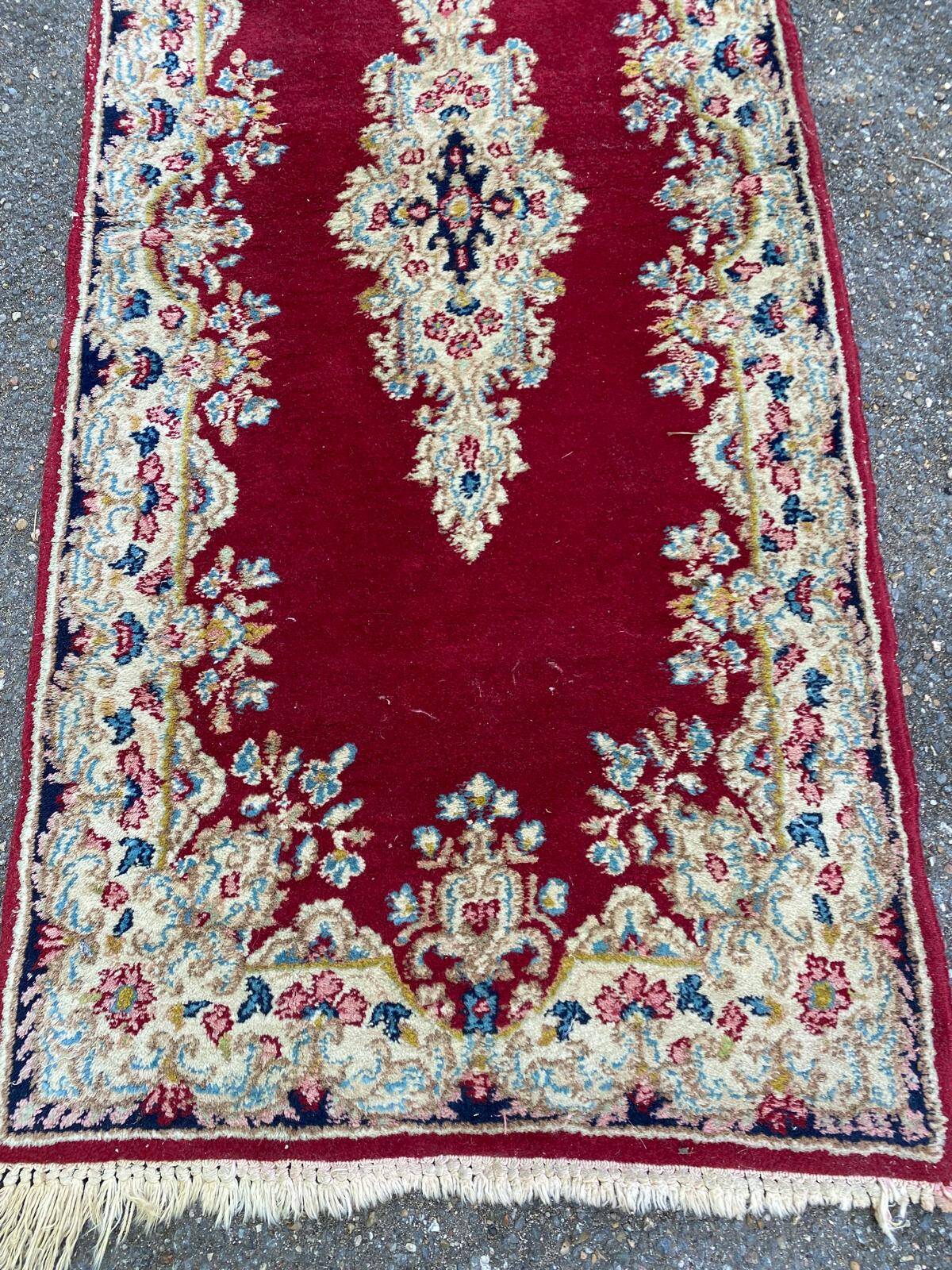 Handmade red Persian wool rug 60x135cm