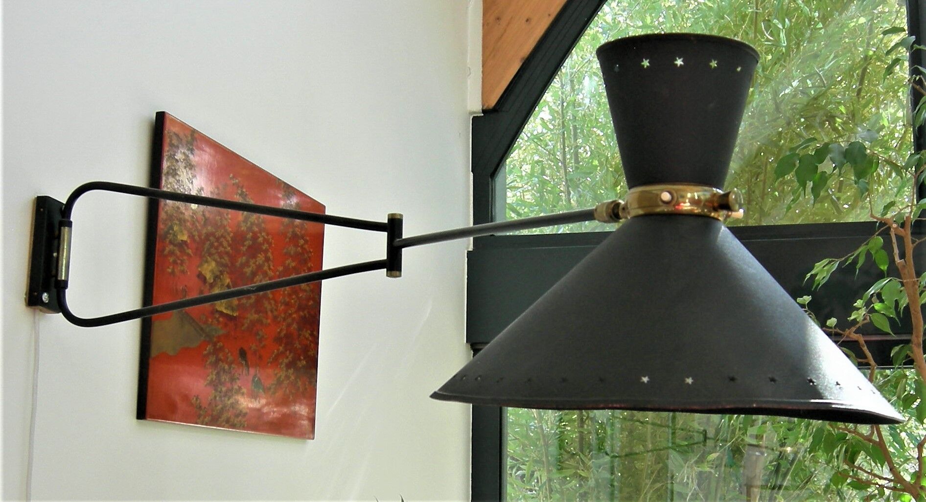 Roger Mathieu's diabolo sconce for Lunel with double lighting