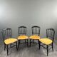 Set of four Napoleon III chairs in blackened wood, 19th century.