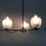 Vintage chandelier with 3 branches in chrome metal and glass globe. Year 70