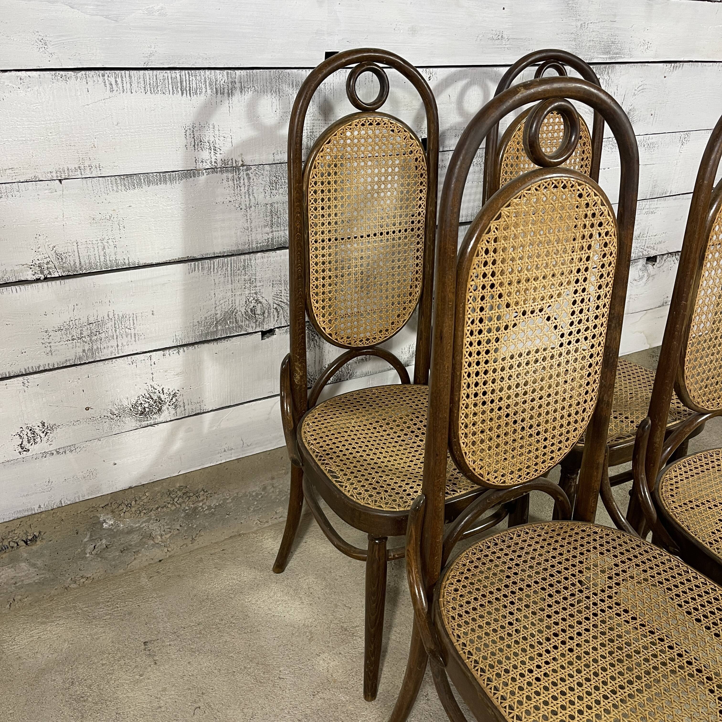 Series of 4 canned bistro chairs