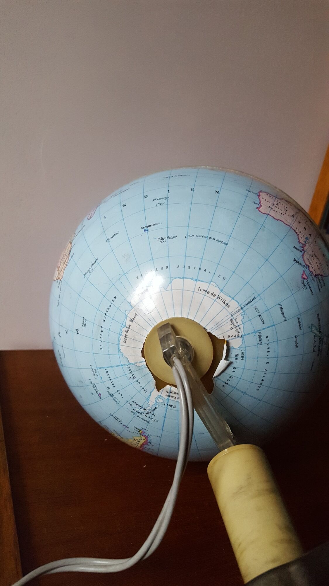 Bright vintage Earth globe brand Vulliermes with metal tripod foot