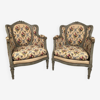 Pair of Louis XVI style wing chairs in gray lacquered wood. Late 19th century