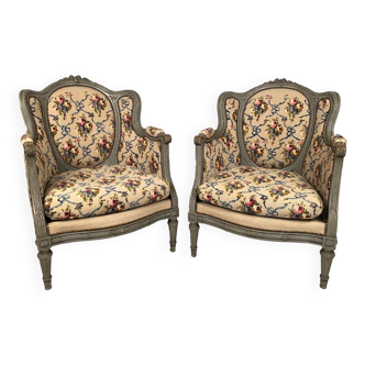 Pair of Louis XVI style wing chairs in gray lacquered wood. Late 19th century