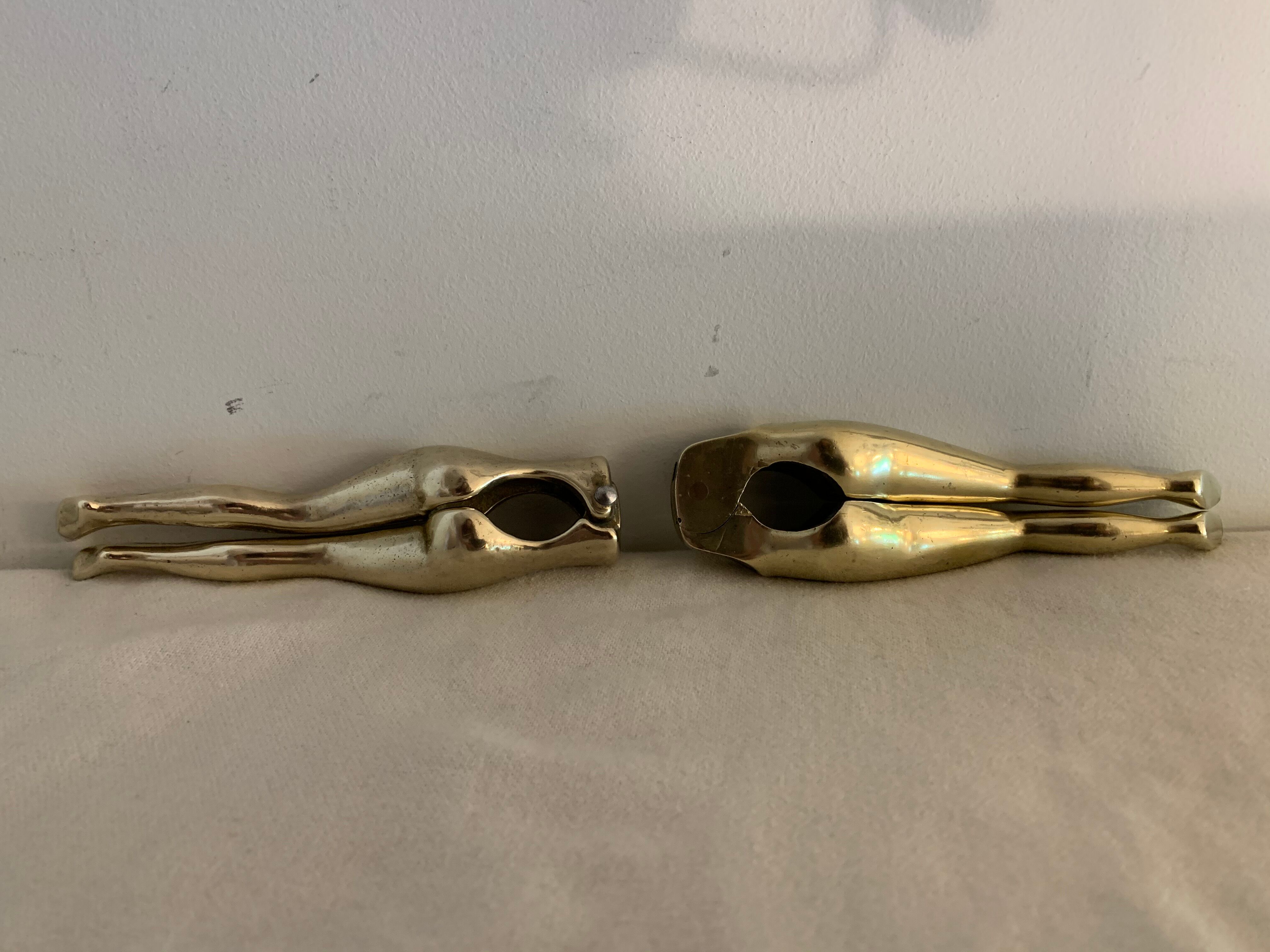 Pair of nutcrackers or anthropomorphic hazelnuts in bronze