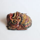 Two polychrome painted and gold leaf gilded Barong dance masks from Bali, Indonesia.