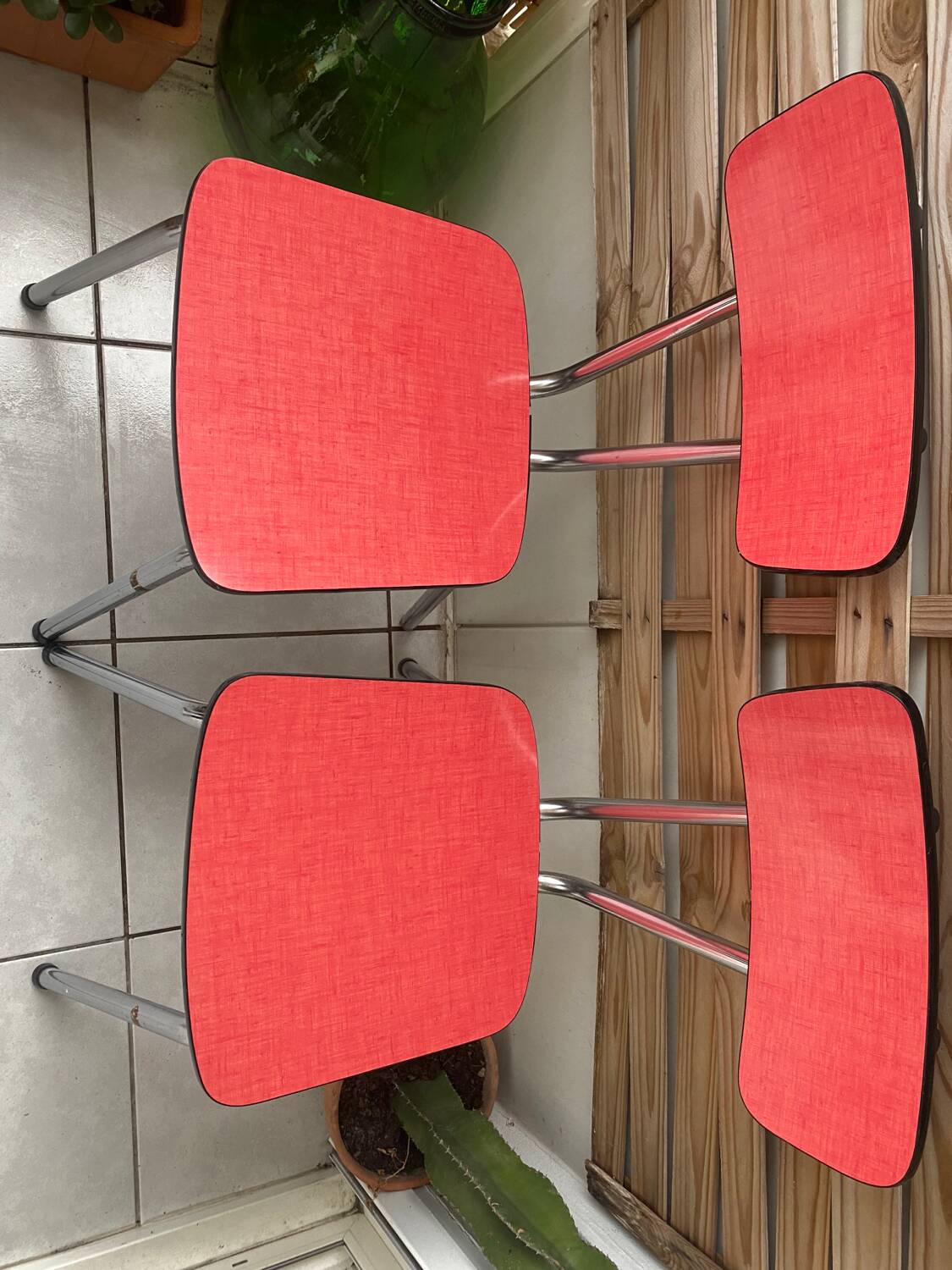Pair of raspberry formica chairs