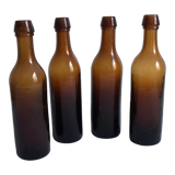 Set of 4 old amber bottles
