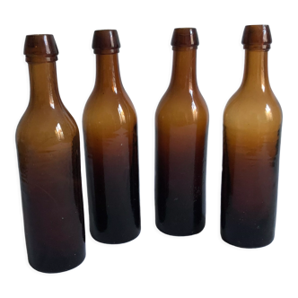 Set of 4 old amber bottles