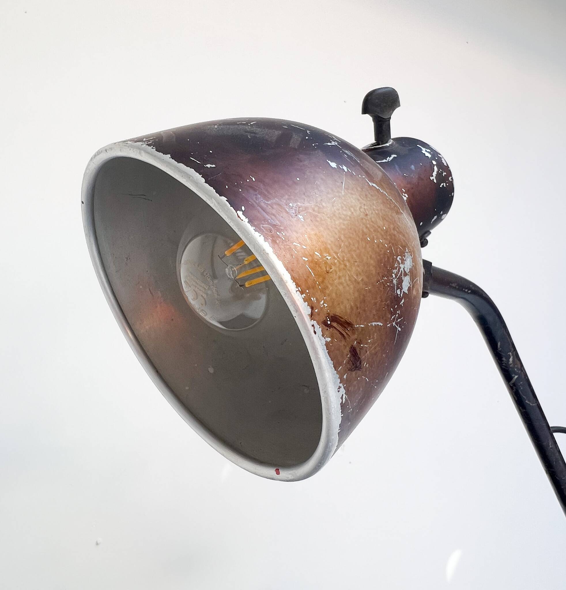 Industrial in height to be adjusted vintage clamp lamp from the 1970s