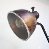 Industrial in height to be adjusted vintage clamp lamp from the 1970s