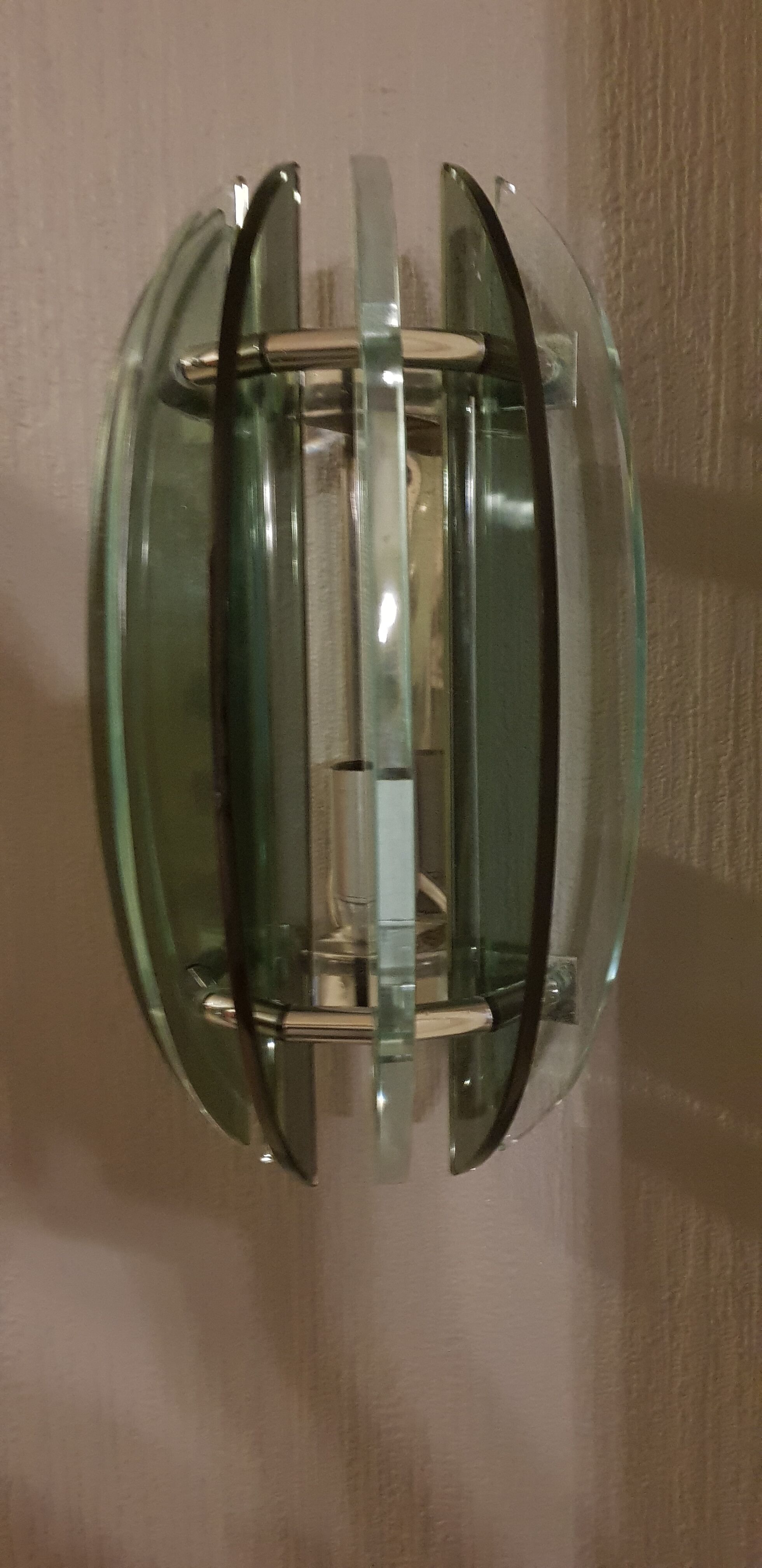 Veca pair of vintage wall light dating from the 1960s.