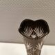 Crystal glass vase, in burgundy/reddish coloured glass with translucent details.