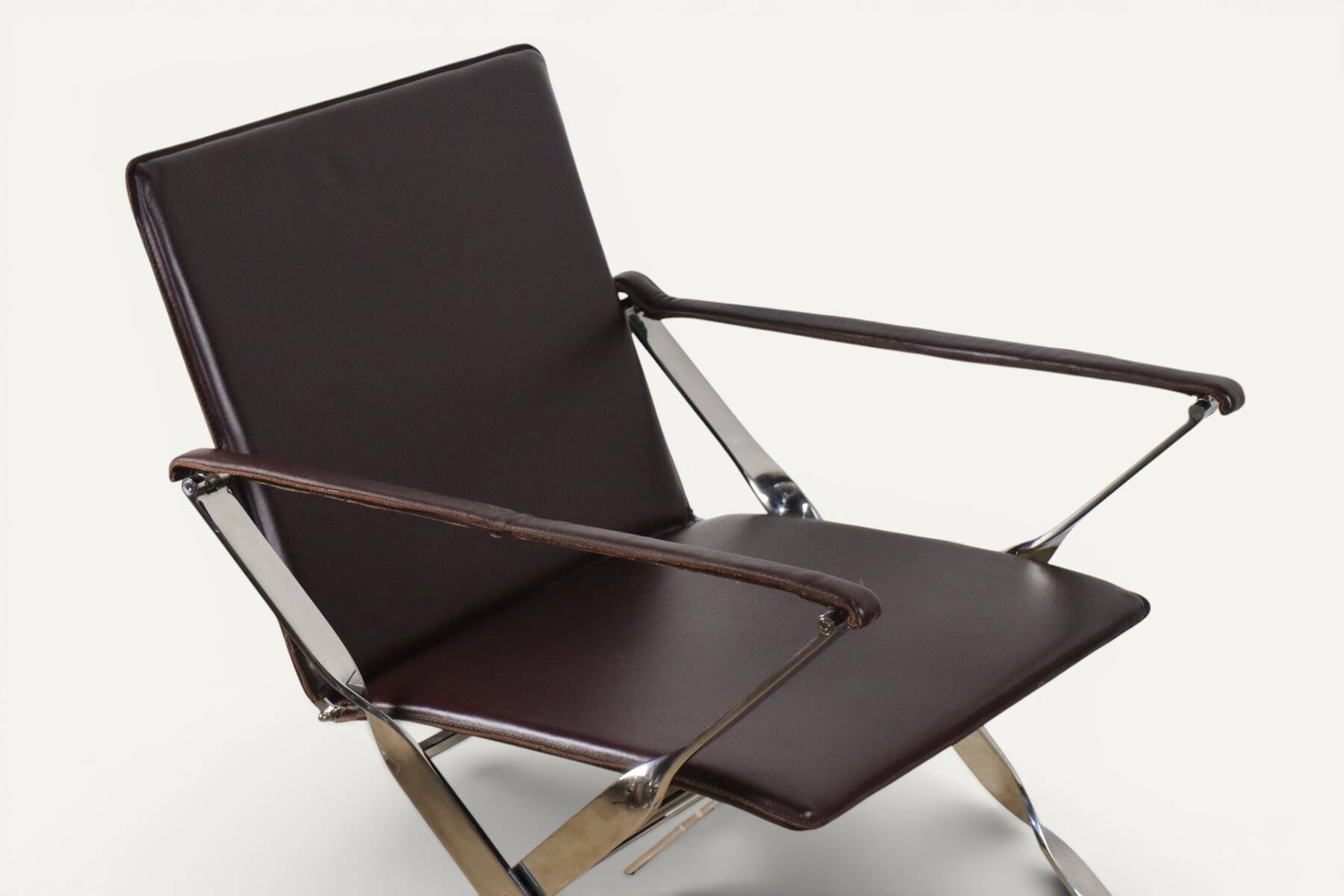 Pair of leather and chrome metal armchairs, Italy - 1970