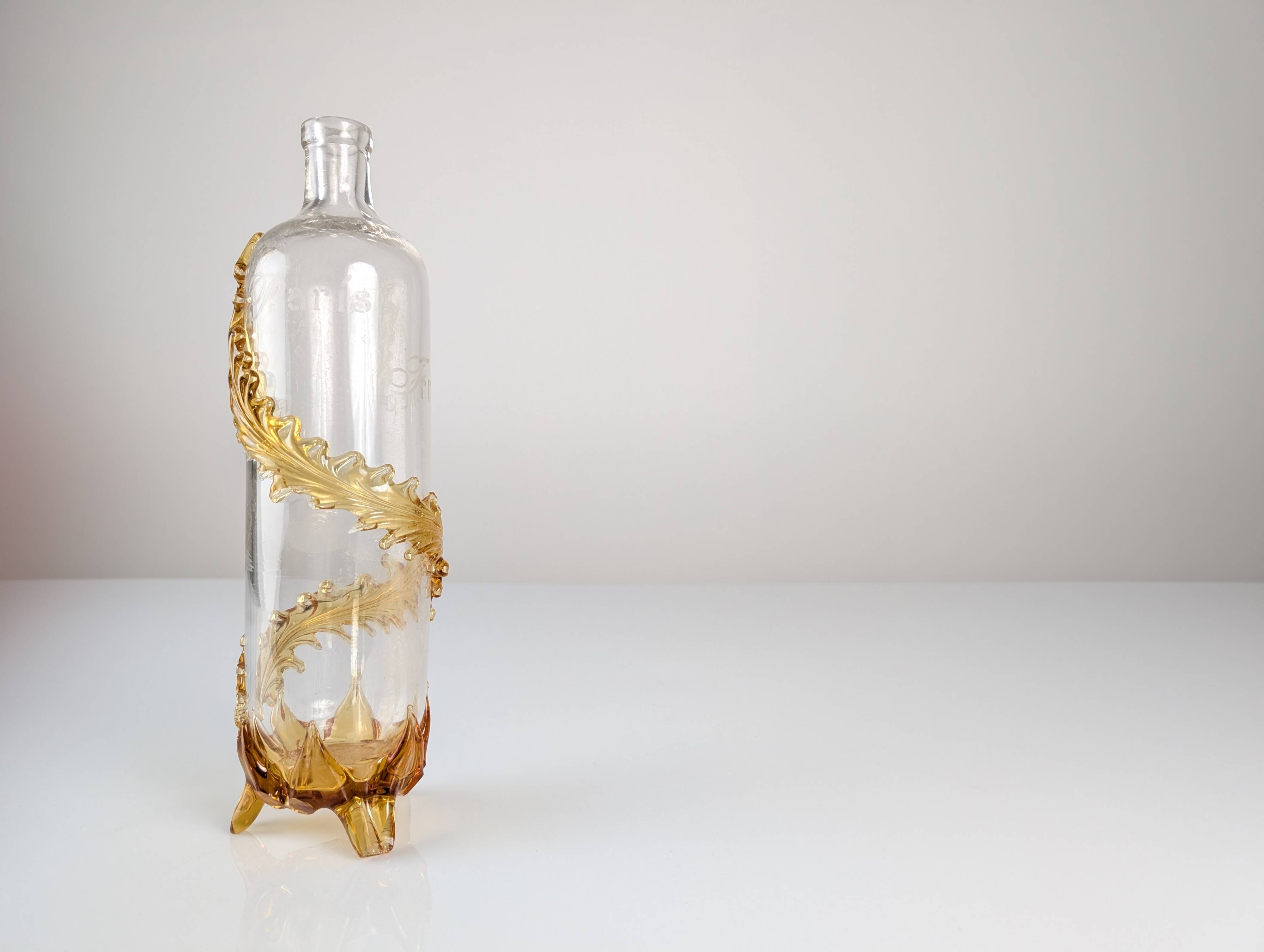 French Art Nouveau Uranium Glass Bottle with Applied Amber Leaves, c. 1900