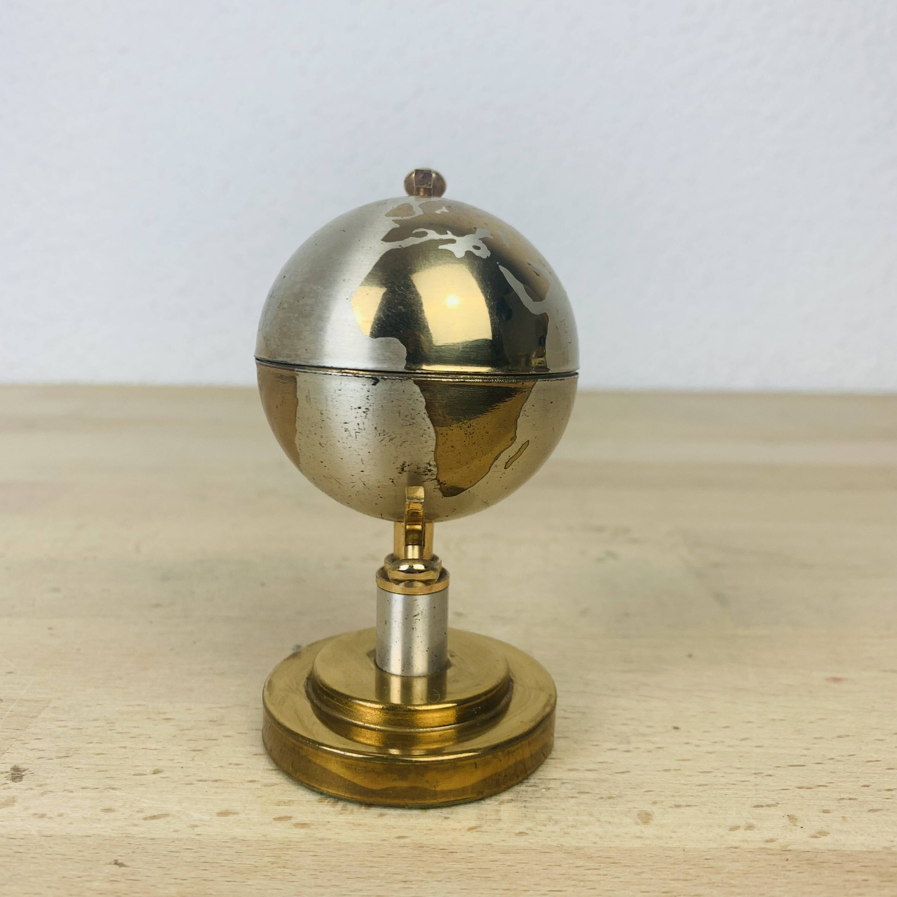 Vintage brass globe lighter