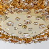 Floral wall light in gilded brass and cut glass by Palwa, Germany, 1970s.