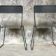 Pair of stackable metal chairs with sled feet - 1960
