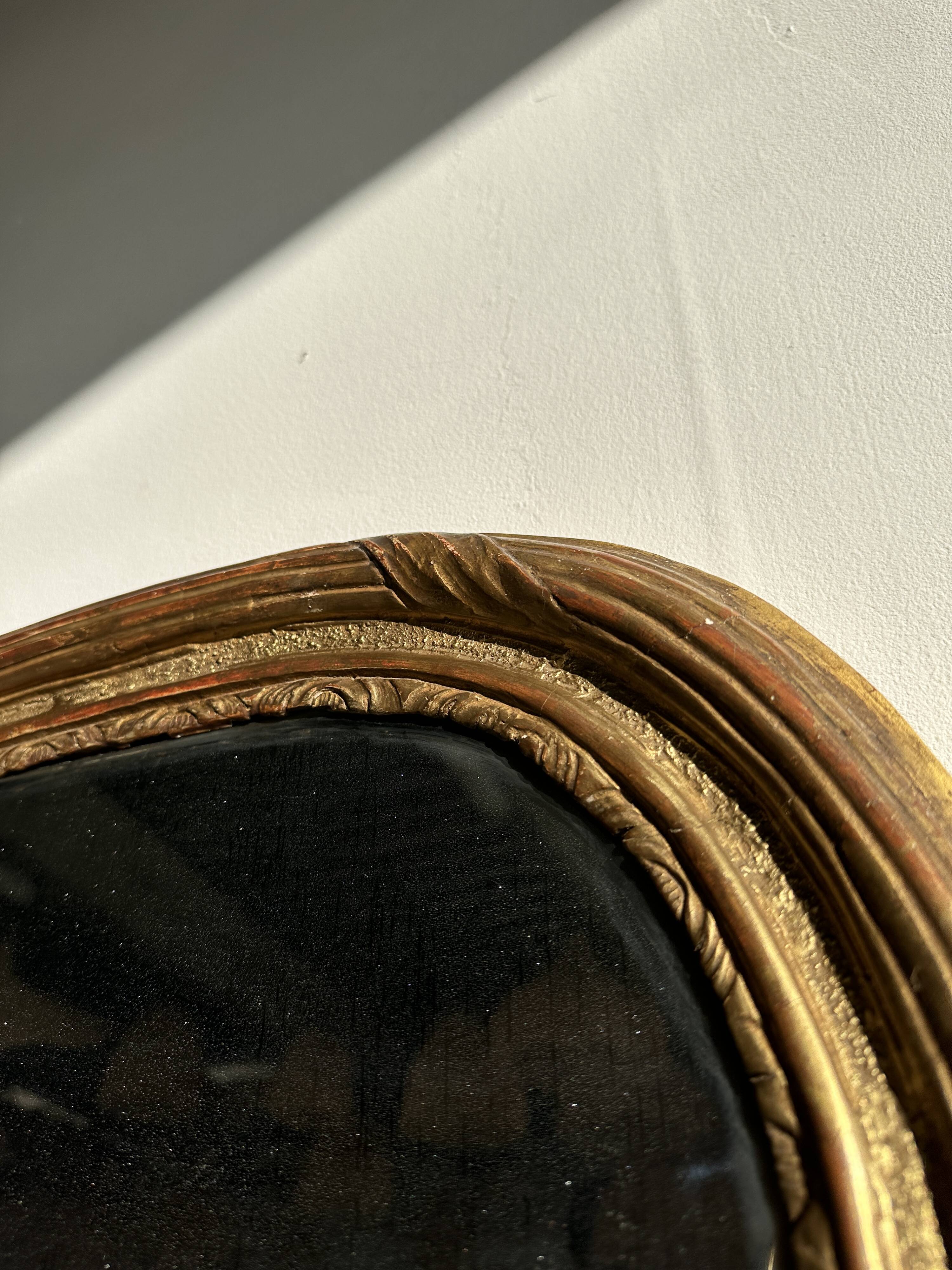 Large gilded mirror 19th century rounded corners mercury glass Louis XVI style