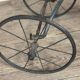 Children's tricycle made of wrought iron, around 1900.