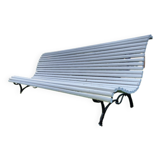 Old garden bench with cast iron legs