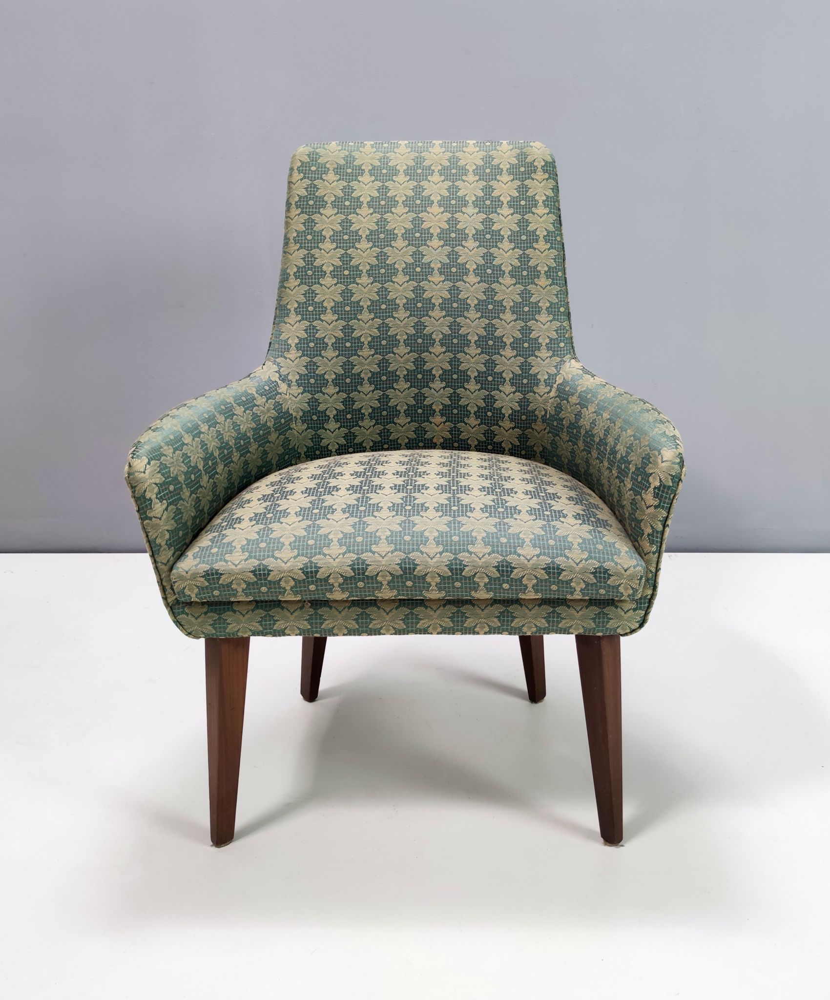 Green fabric and beech armchairs, italy