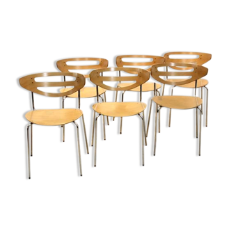 Thonet dining chairs stacked in chrome and beech