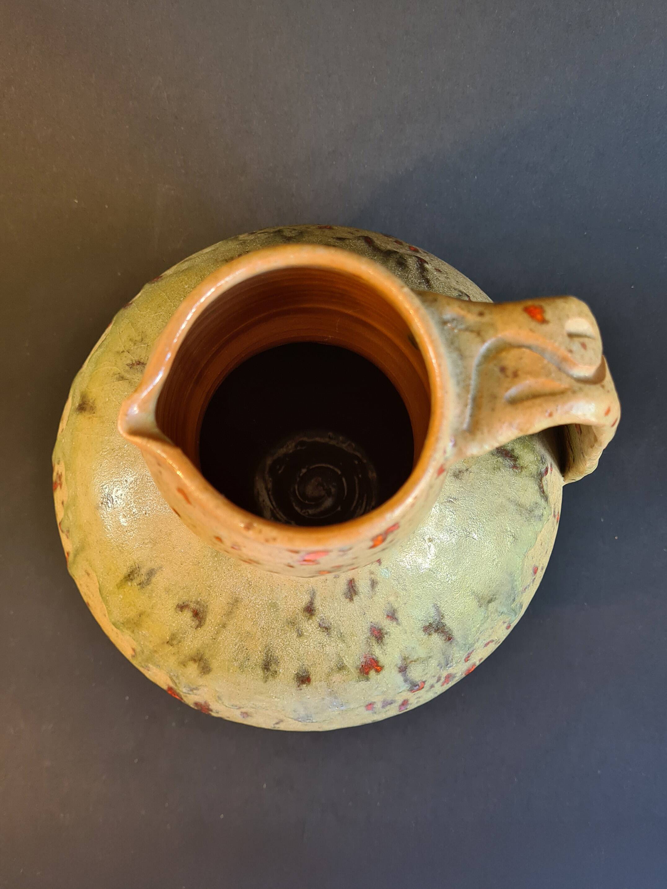 Large vintage terracotta pitcher signed “Orezza”