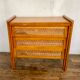Modernist vintage chest of drawers in light chene has 3 drawers rattan top changing table