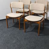 A set of four vintage teak dining chairs