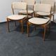 Un ensemble de quatre chaises de salle à manger en teck vintage.