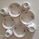 4 antique cups and saucers