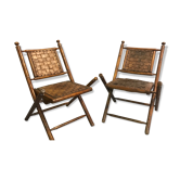 Former colonial armchairs in braided leather