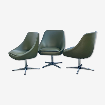 Trio of vintage leatherette swivel chairs