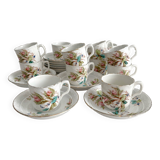 12 ironstone coffee cups with polychrome floral decoration, KG Lunéville