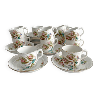 12 tasses à café en terre de fer décor floral polychrome KG Lunéville