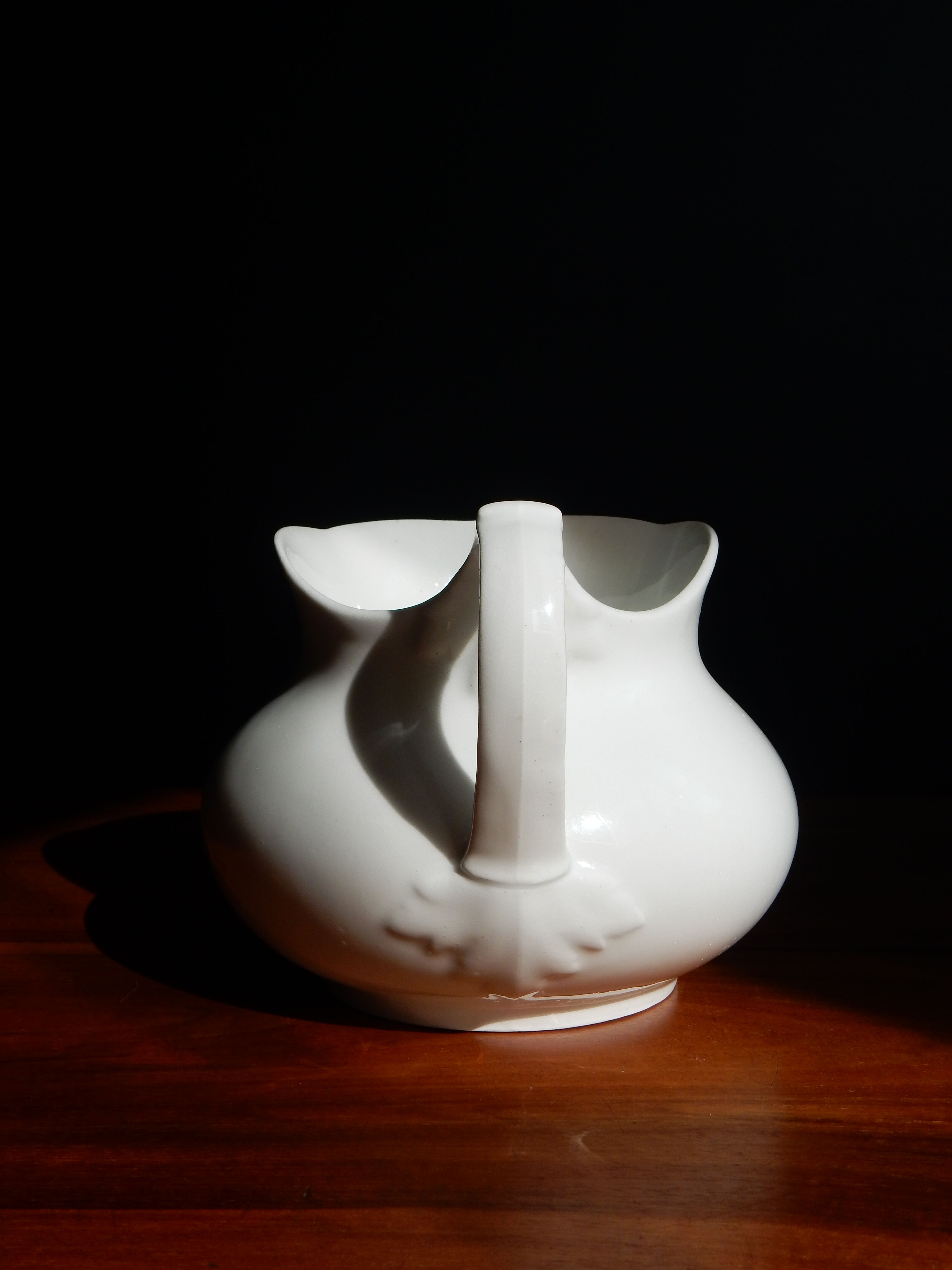White ceramic water pitcher broc pot