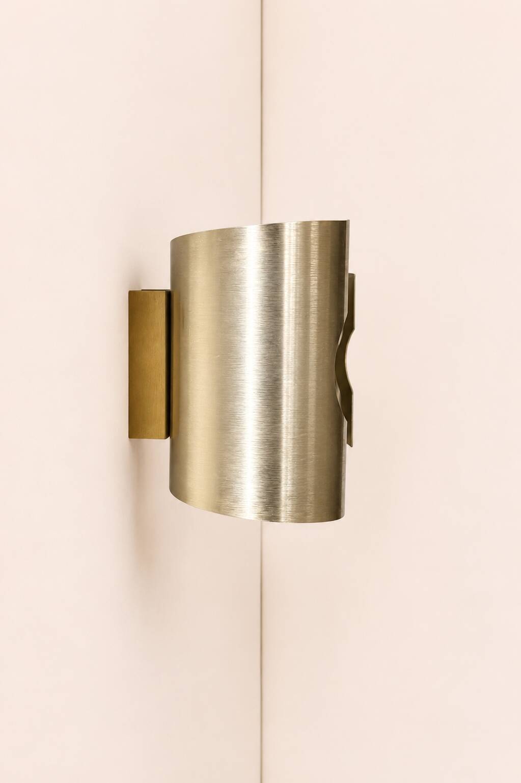 Pair of vintage wall sconces in brushed metal with a slight gold finish, France 1970.