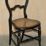 Four antique Regency bergère chairs with mother-of-pearl inlay.