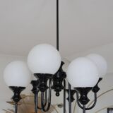Metal chandelier and glass globes