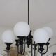 Metal chandelier and glass globes