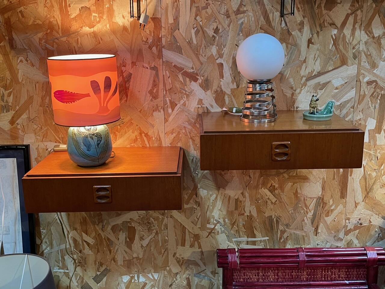 Suspended teak bedside tables in vintage 1960s Scandinavian style.