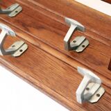 Baggage door and wooden coat rack