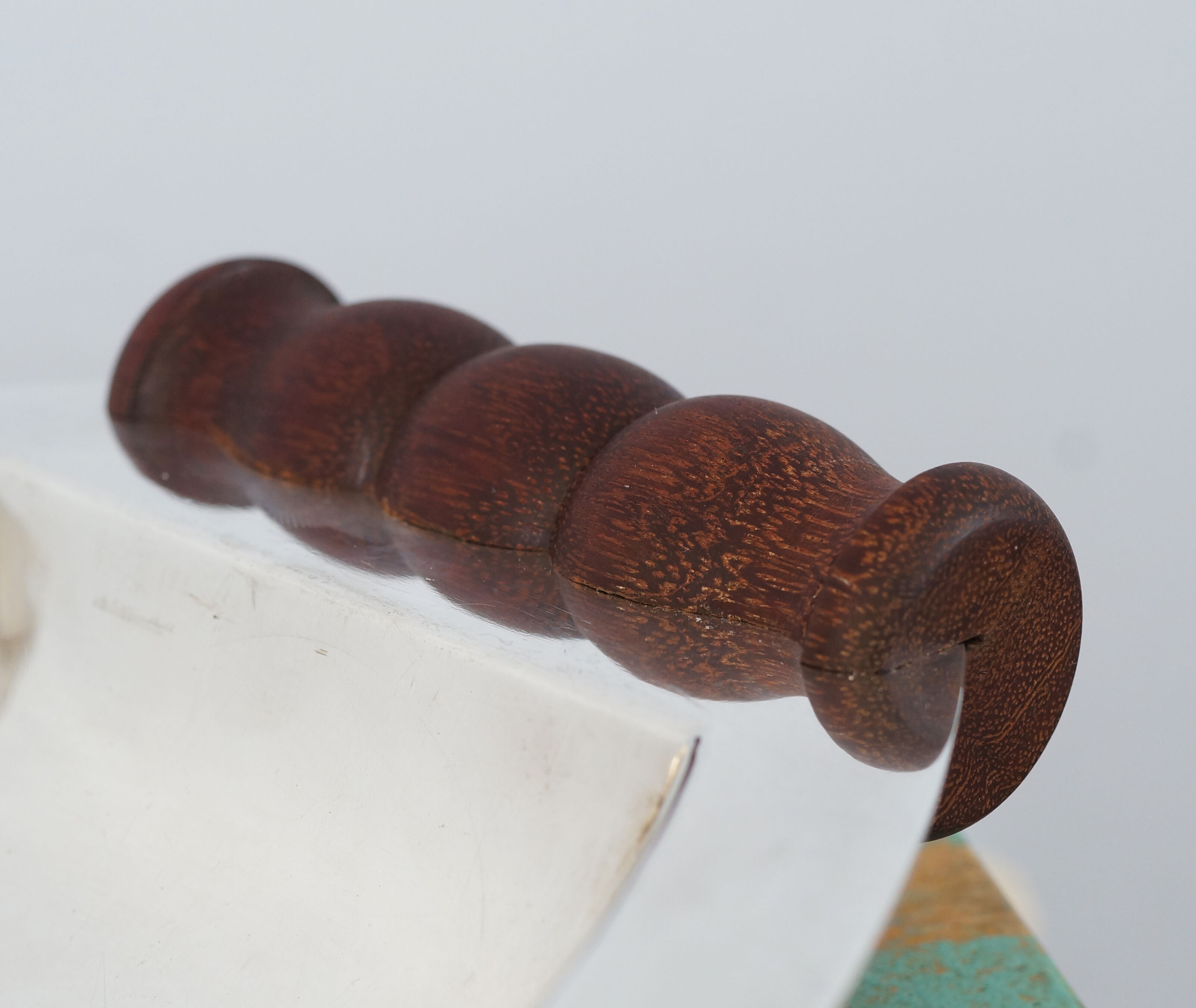 Silver plated metal hollow dish and mahogany handles