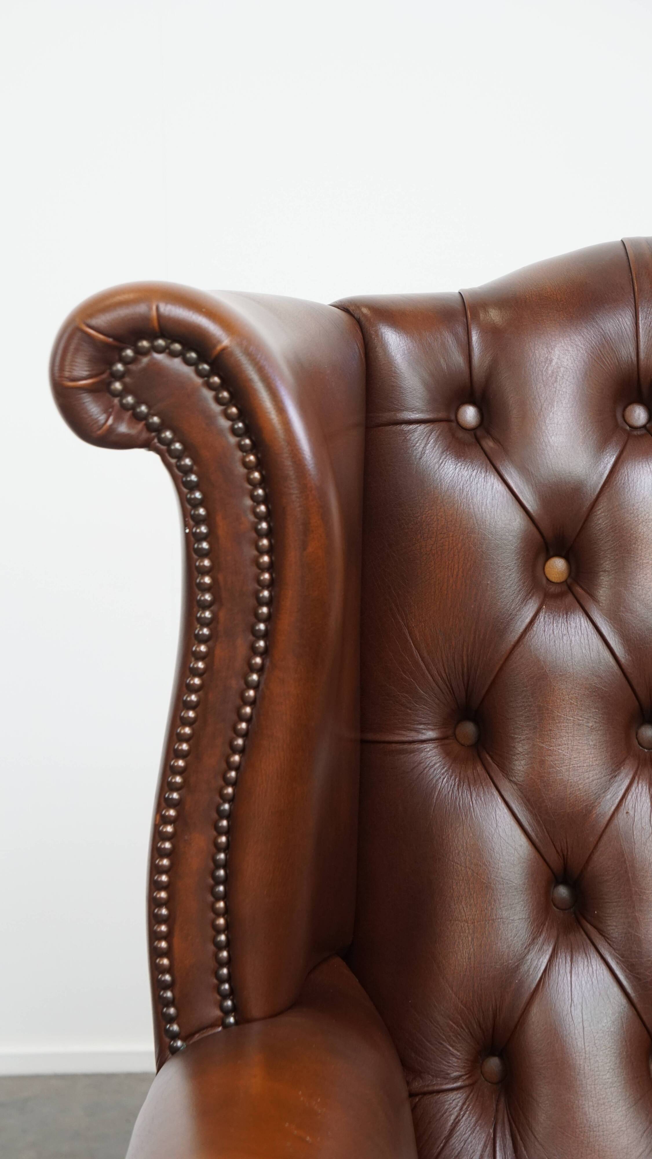 Chesterfield wing chair in dark brown English cowhide