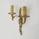 Antique double wall sconce in bronze, acanthus leaf design.