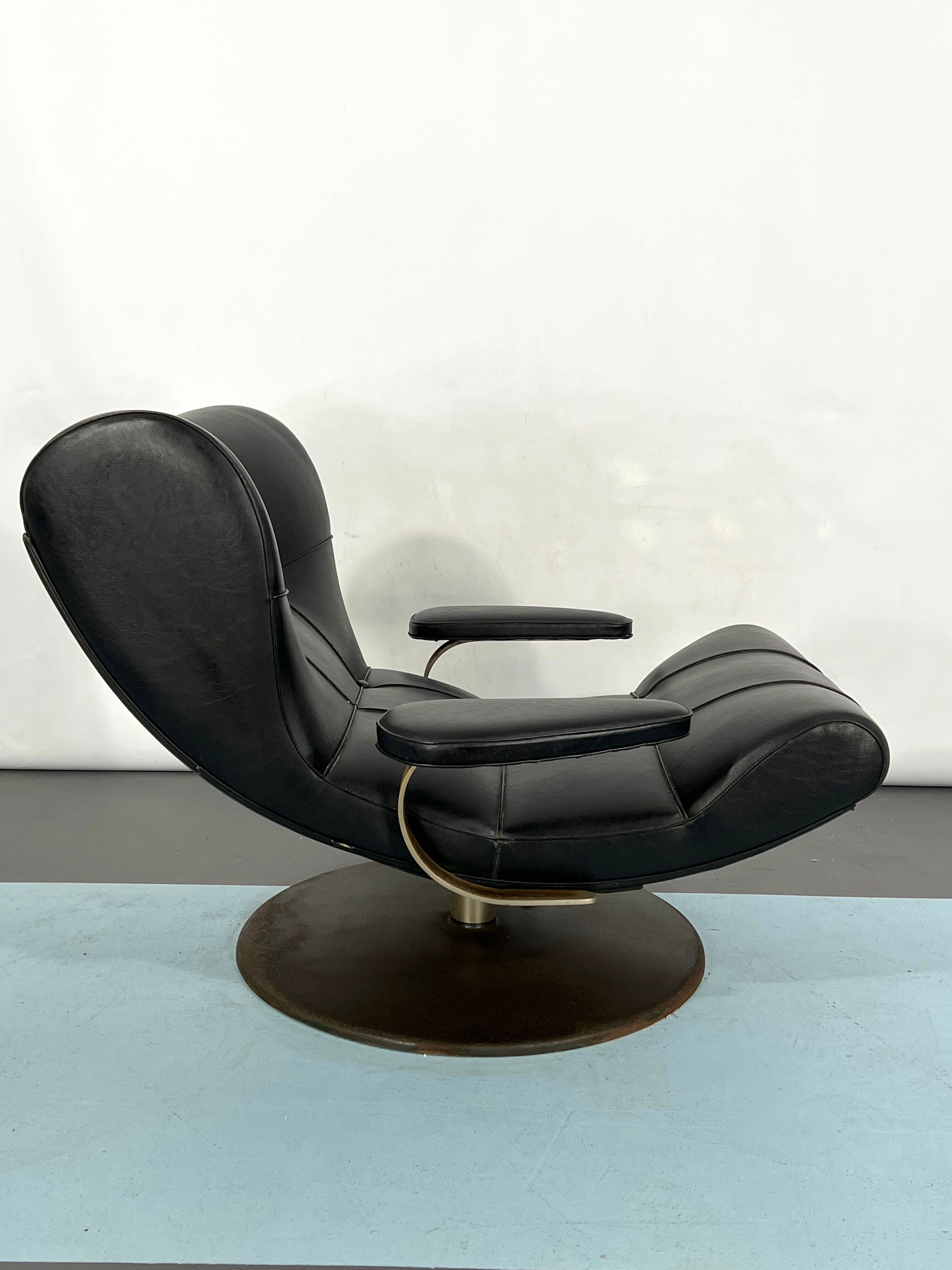 Vintage Italian black swivel armchair from 60s