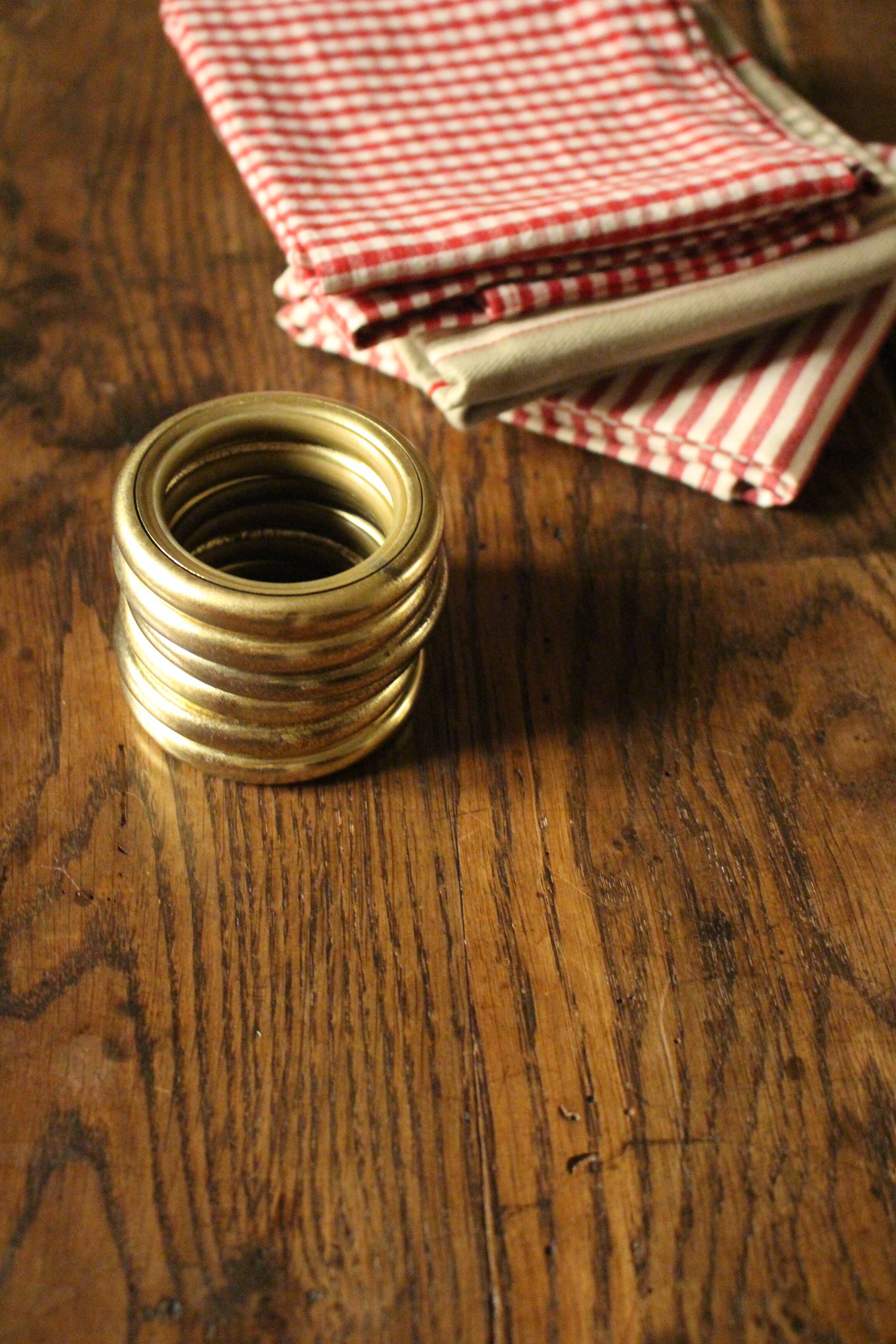 Lot of 6 patinated golden metal towel rings