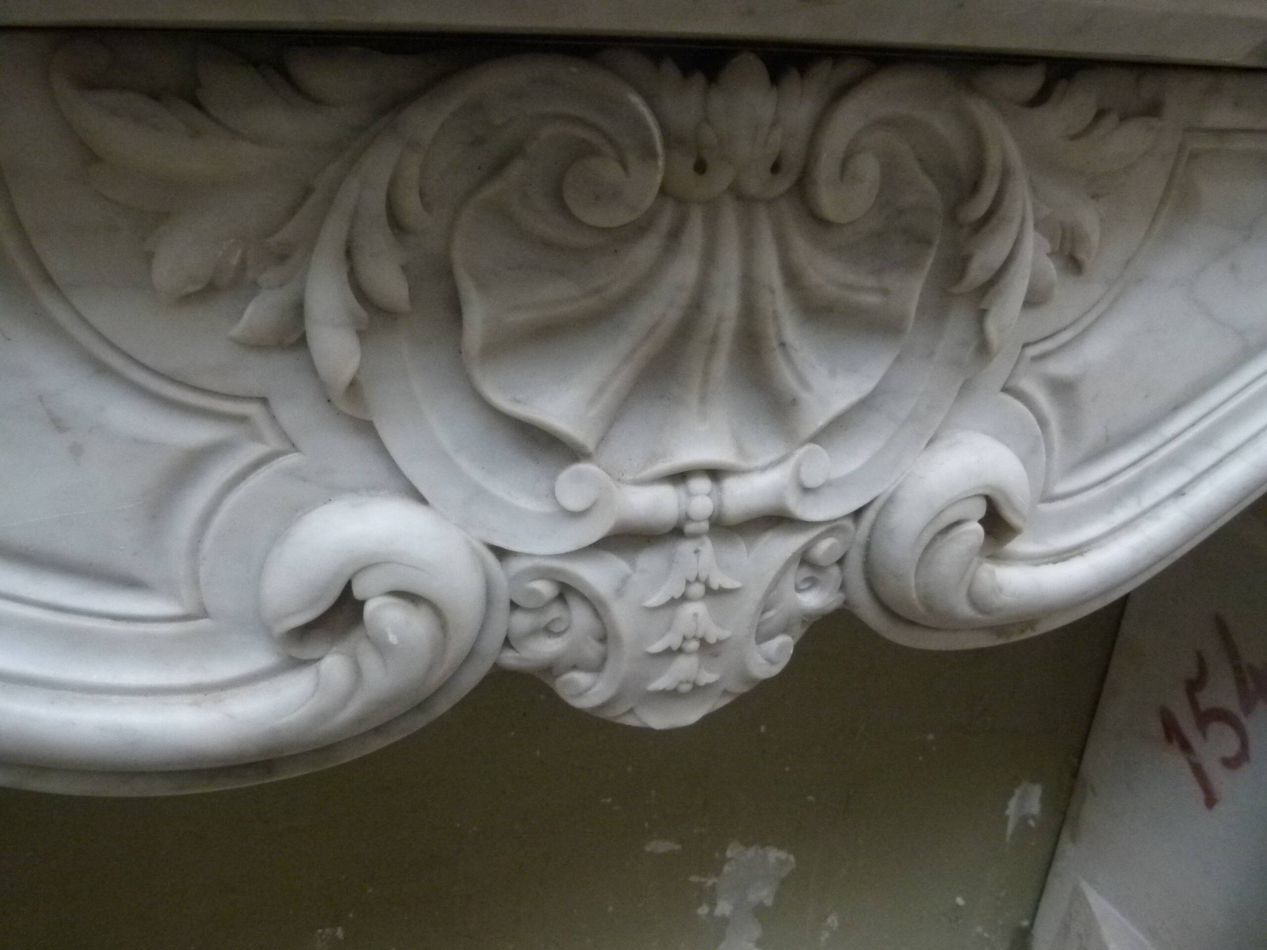 Louis XVI marble fireplace from the 19th century