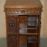 Victorian carved oak revolving library, circa 1880.